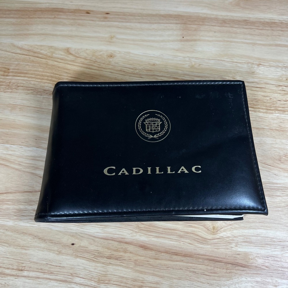 1999 Cadillac DeVille Owners Manual Set with Black Leather Portfolio Case